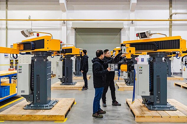 employees working together on a LiftMaster